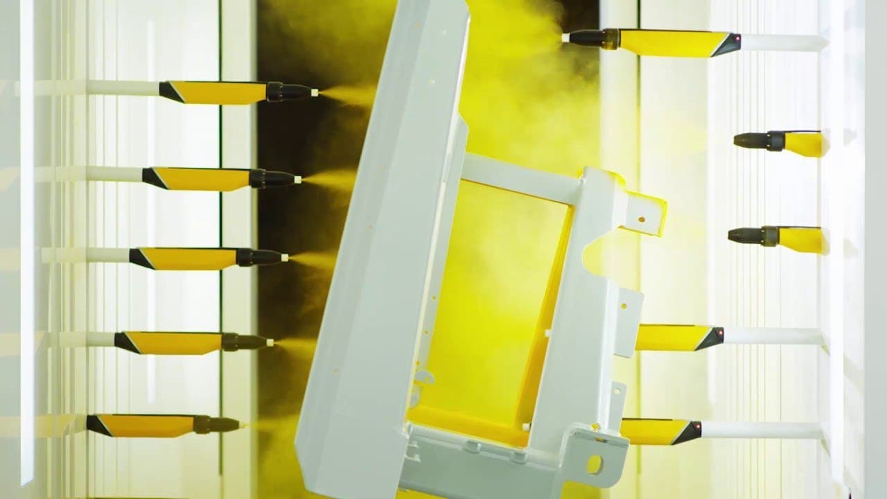 Reciprocator spray guns coating a part